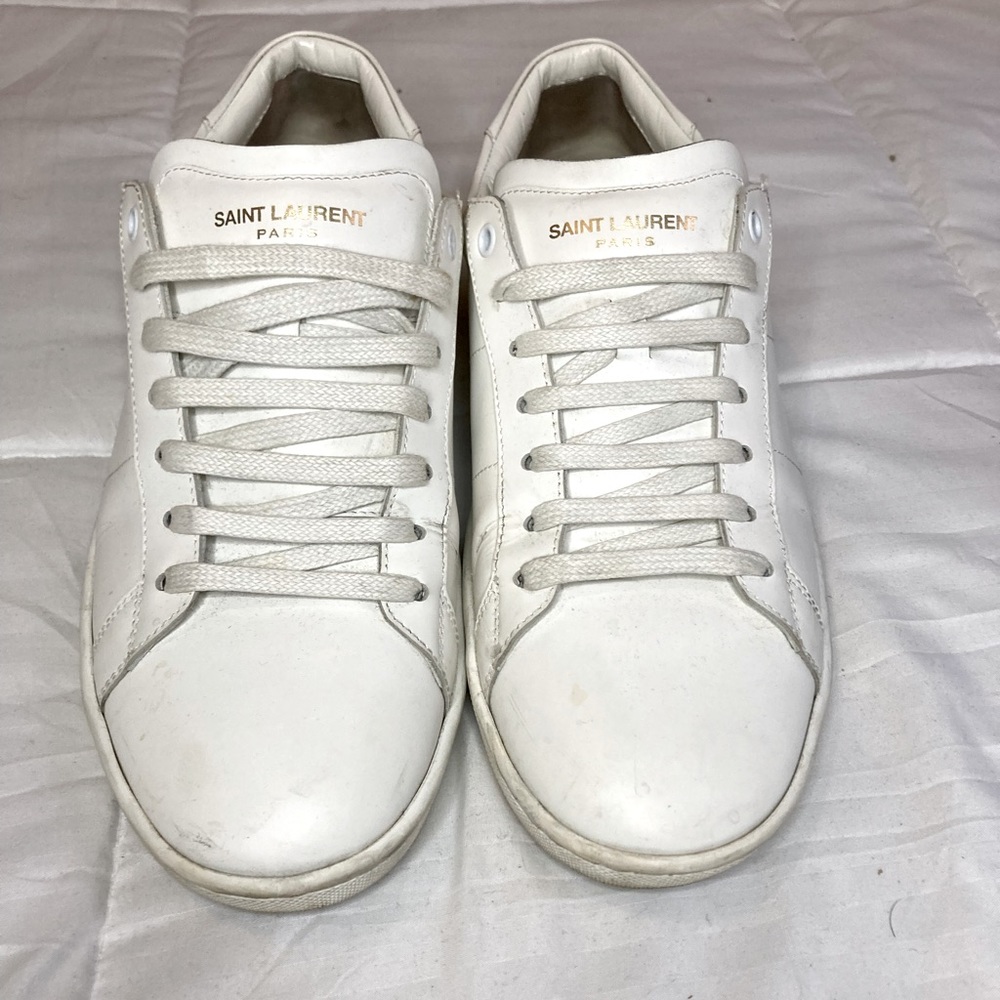 Saint Laurent Paris white low top sneakers.
